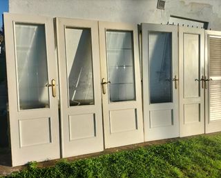 12 puertas de madera , de calidad, ver des