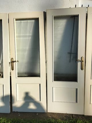 12 puertas de madera , de calidad, ver des