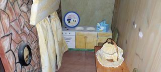 Casa de muñecas de madera