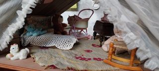 Casa de muñecas de madera