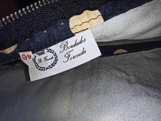 Traje de flamenca azul y rojo con lunares blancos