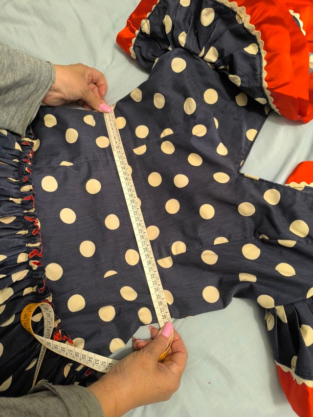 Abito da flamenco blu e rosso a pois bianchi