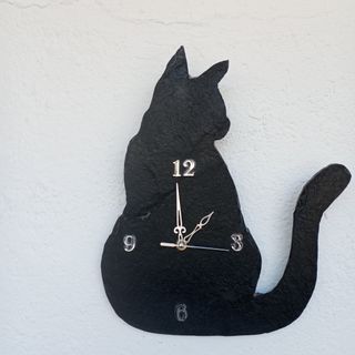 Reloj de pared gato negro
