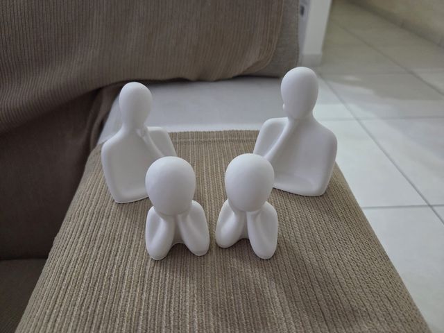 Set 4 statuette famiglia ceramica