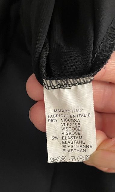 Top lungo, senza maniche, collo con paillettes 