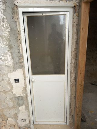 Puerta aluminio lavadero