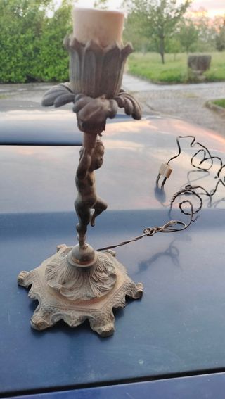 Lampada candeliere comò antica  in netallo  putto