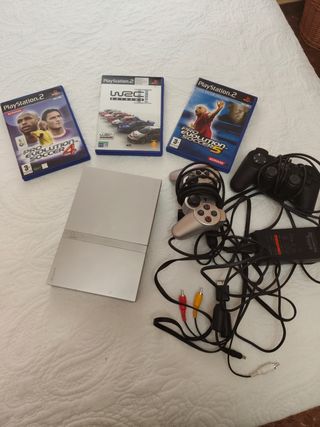 PlayStation 2 (PS2) gris plata + juegos