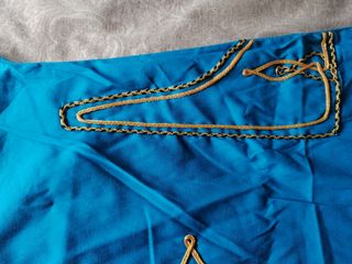 Túnica egipcia azul y amarilla