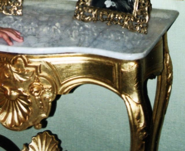 Consola Isabelina pan de oro.