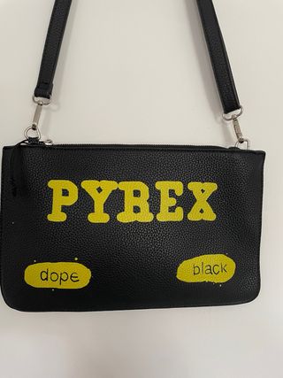 Pochette Pyrex nera e gialla second hand for 10 EUR in San Giuliano  Milanese in WALLAPOP