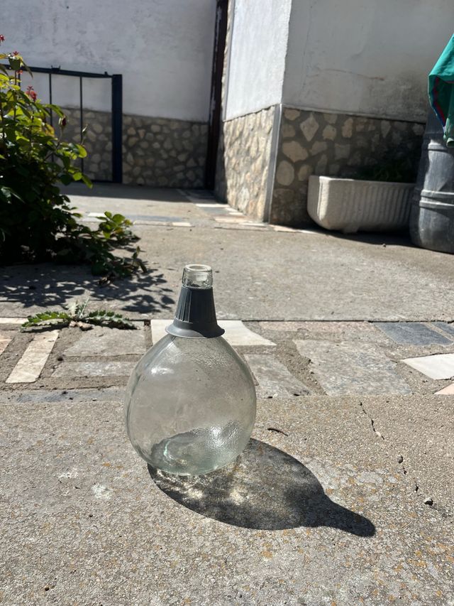 Damajuana de vidrio transparente