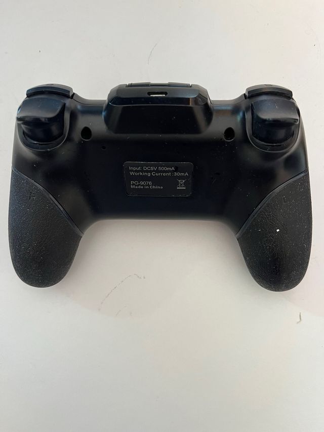 Mando ípega con soporte para móvil y USB