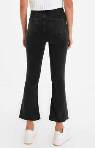 Vaqueros negros tipo flare