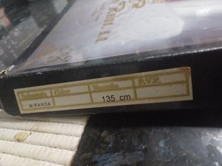 Sábanas de raso nuevas, en su caja original.