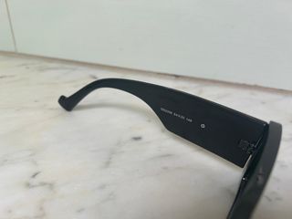 Occhiali Gucci neri e oro