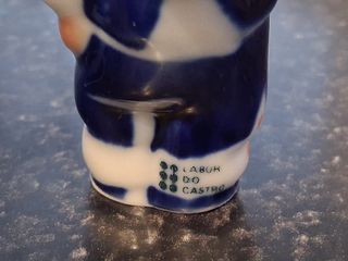 Figura de porcelana de musicos