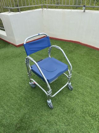 Inodoro profesional portátil azul y plateado