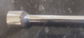 Llave, cambio de neumáticos.