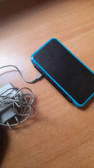 Nintendo 2DS XL funda y juegos