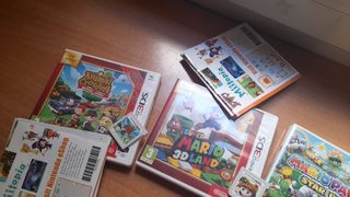 Nintendo 2DS XL funda y juegos