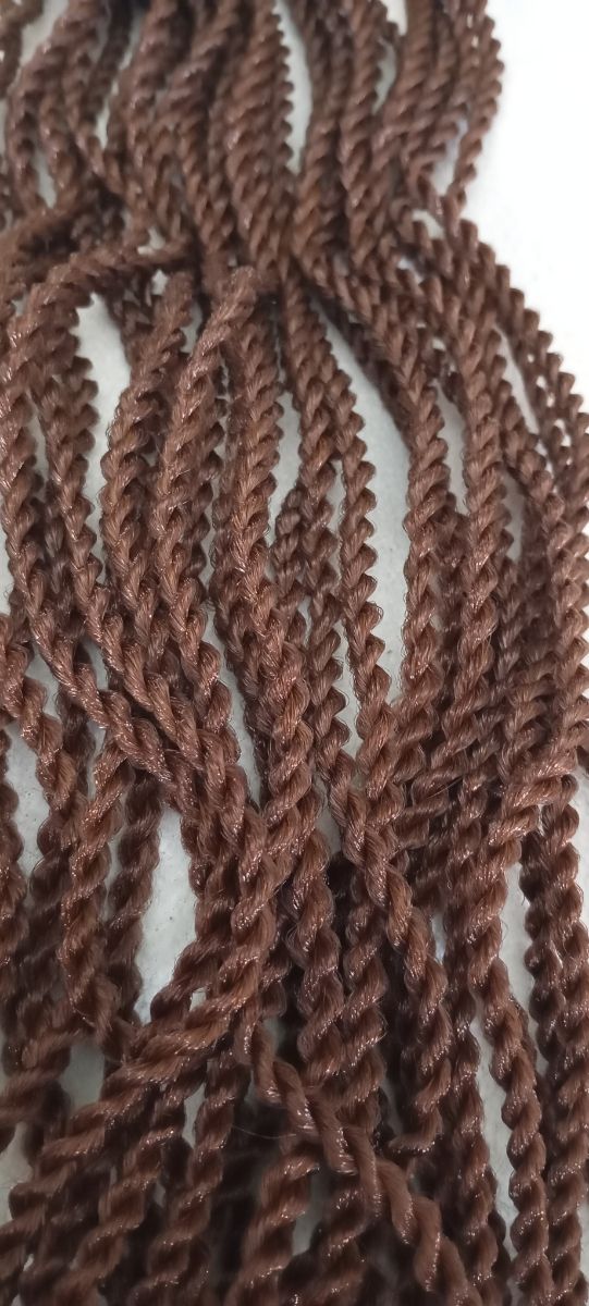 Extensiones trenzadas marrones, en forma de cordón