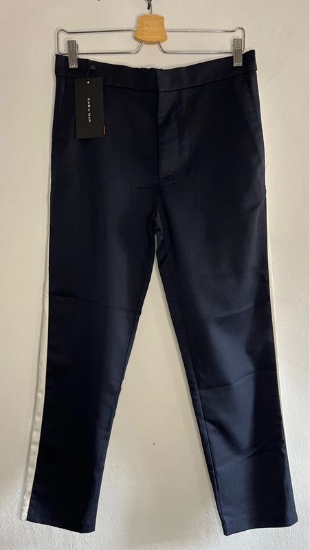 Pantalón carrot fit bandas Zara hombre azul