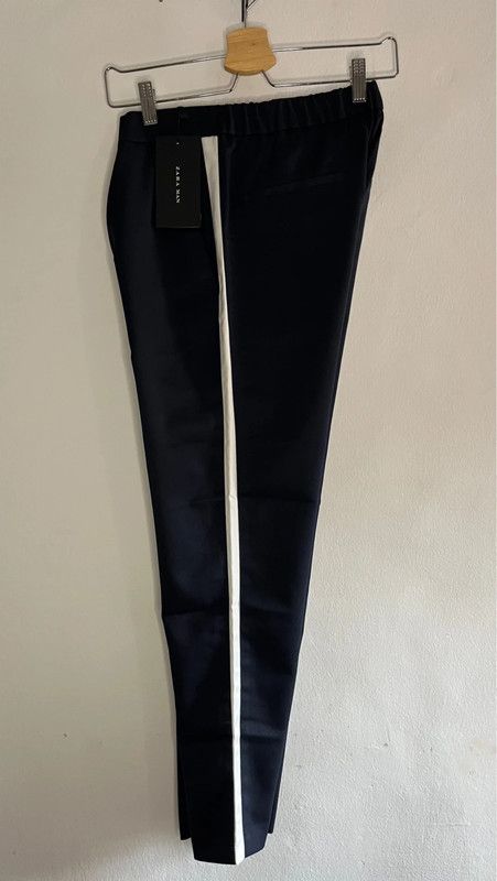 Pantalón carrot fit bandas Zara hombre azul