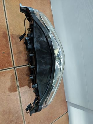 Faro Suzuki Burgman 125-150 carburación.