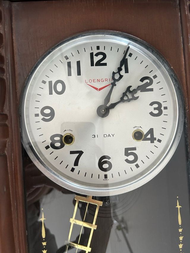 Orologio a pendolo antico