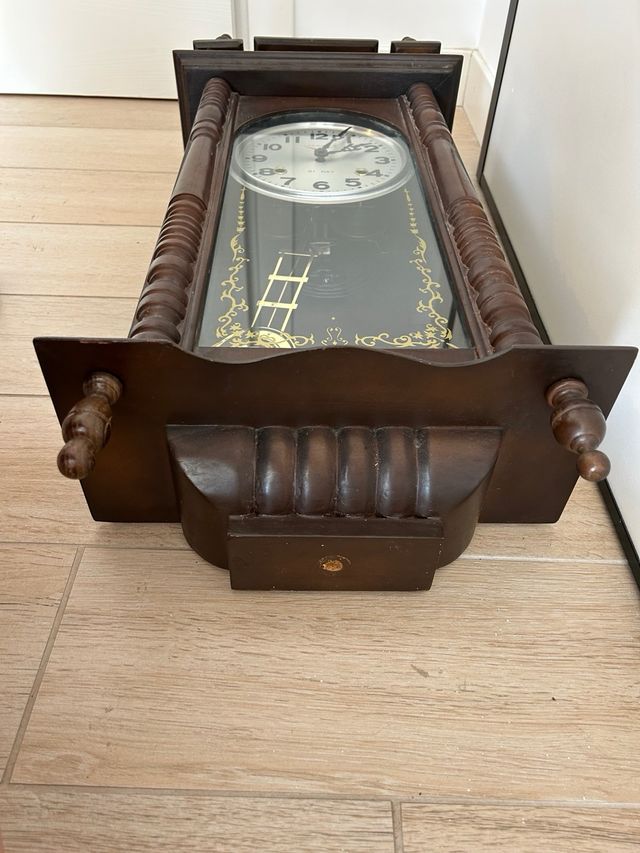 Orologio a pendolo antico