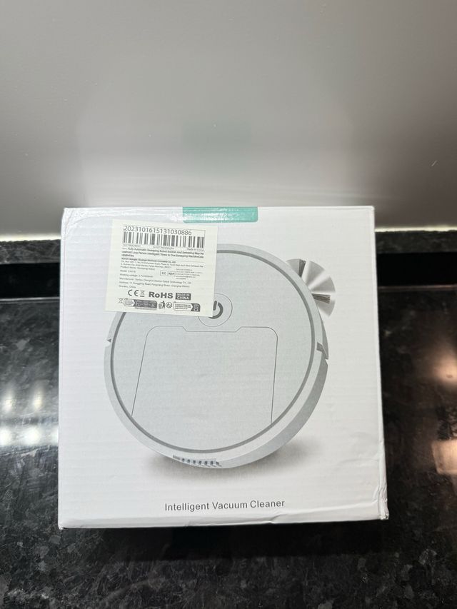 Mini robot aspirador