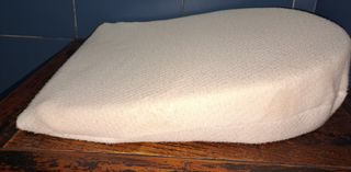 Cuscino antireflusso per cesta