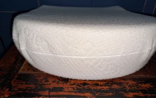 Cuscino antireflusso per cesta