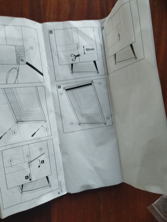 Mosquitera enrollable gris - nueva, marcos blancos