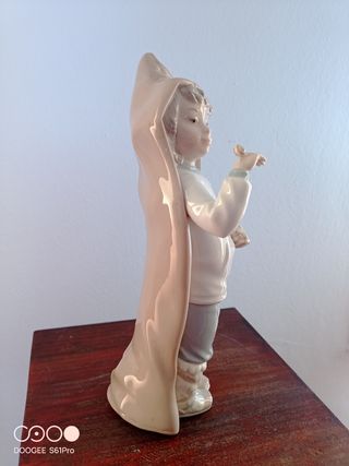 Niño Lladró con Caracoles