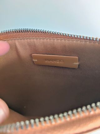 Cartera de mano.
