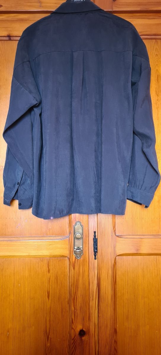 Camisa negra con brillos Zara