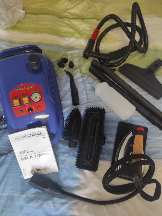 Stazione di lavaggio e stiratura a vapore