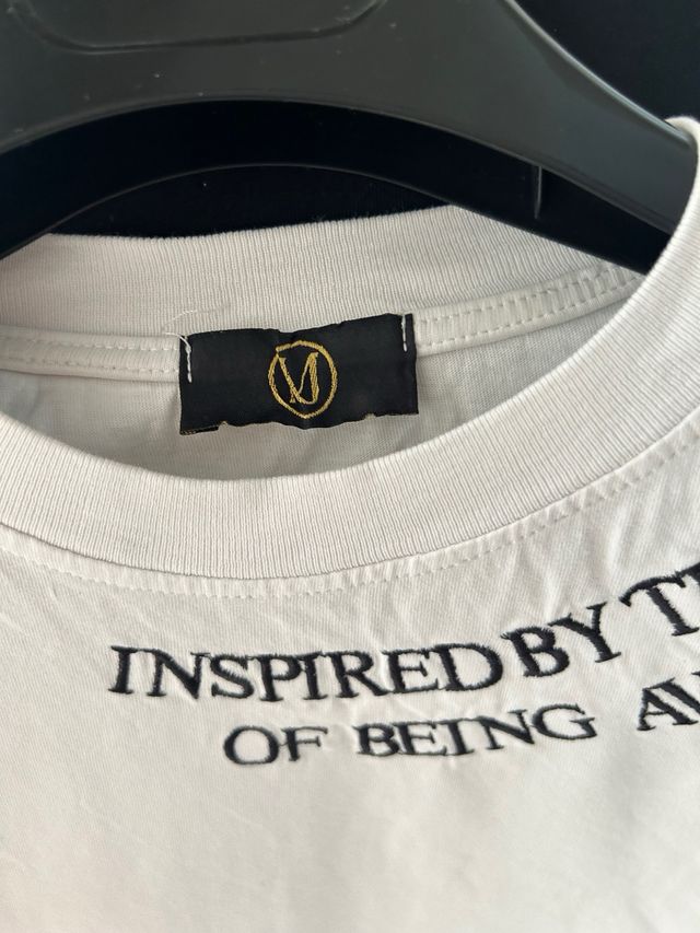 Tshirt uomo bianca “INSPIRED BY THE FEAR OF BEING AVERAGE” Taglia M