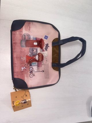 Bolso/Cartera de mano. Es de sweet candy
