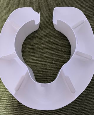 Asiento elevador inodoro