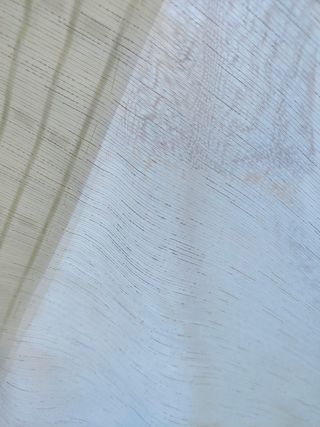 Cortina blanca translúcida super Grande.