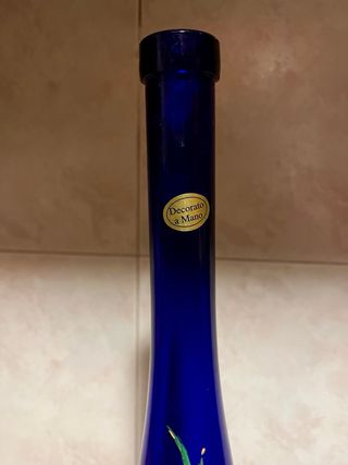 Bottiglia vintage di grappa dipinta a mano