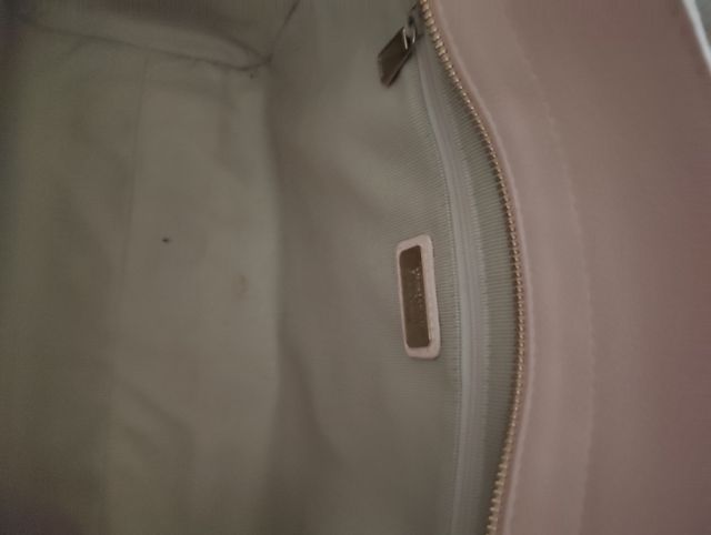 Bolso Furla original,sin estrenar. Rosa clarito.