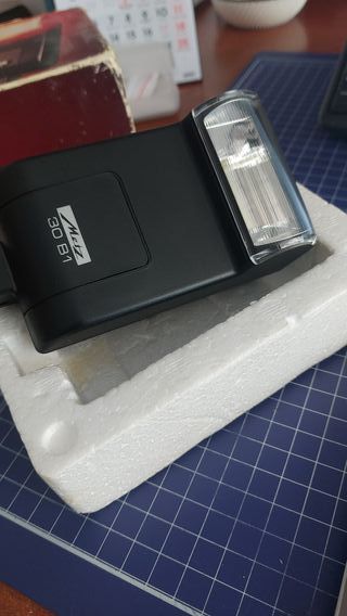 Flash camara de fotos reflex.