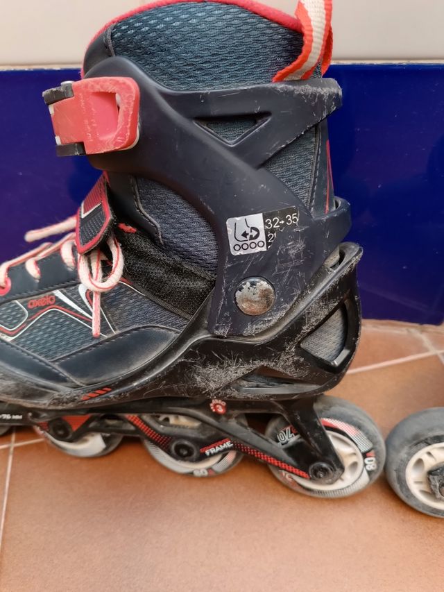 Patines Oxelo talla 32-35, conos, protec. y bolsa