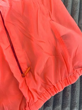 Cortavientos naranja mujer