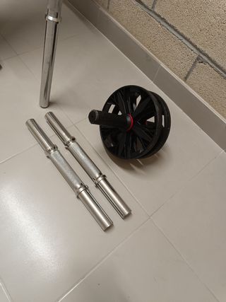Banco + kit de musculación 93kg.