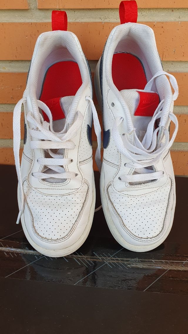 Zapatillas Nike blancas y azules